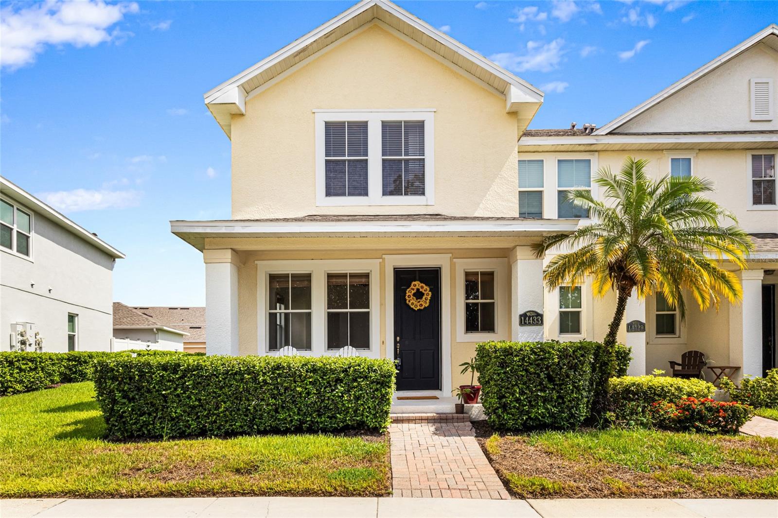 Welcome Home to this beautiful 3-bedroom, 2.5-bathroom townhome located in the highly sought-after Independence community! This neighborhood is known for its world-class amenities and strong community atmosphere! Open the door to a formal dining or sitting room with beautiful wood flooring filled with natural light. The open kitchen includes stainless steel appliances, bar-top seating, and large tile flooring. The living room connects you to your outside private, fenced backyard, perfect for relaxing, grilling out, pets, and easy access to the detached two-car garage. Upstairs, you’ll find wood floors throughout, along with all three spacious bedrooms, two full bathrooms, and a convenient laundry closet. As a end unit, coupled with the park directly across the street the home offers you more green space and privacy. Home has brand new AC (2025), New Water Heater (2025), New Smoke decors (2025), and New water efficient toilets in the the bathrooms (2025). Residents enjoy access to two resort-style pools, two fully equipped fitness centers, tennis and basketball courts, and over six miles of bike and walking trails. Beautiful parks, green spaces, and two private lakes with boat ramps provide serene spots for relaxation and water activities. A dedicated Lifestyle Team organizes exciting community events throughout the year, including seasonal festivals, fireworks displays, and food truck gatherings, fostering a vibrant and connected neighborhood. Situated just minutes from Disney and top Orlando attractions, with easy access to Hwy 429 and the Florida Turnpike, this home offers convenience, entertainment, and a true sense of community. The HOA fee covers high-speed internet, cable, exterior paint, roof replacement when needed, exterior and interior pest control, and landscaping maintenance. A must see!