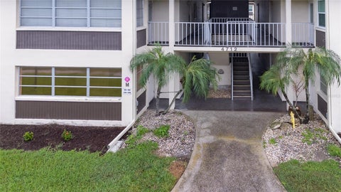 Photo of 4712 Marine Parkway #105, New Port Richey, FL 34652 (MLS # TB8556882)