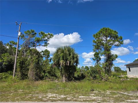 Photo of 1111 Nimitz Boulevard, Lehigh Acres, FL 33974 (MLS # O6354561)