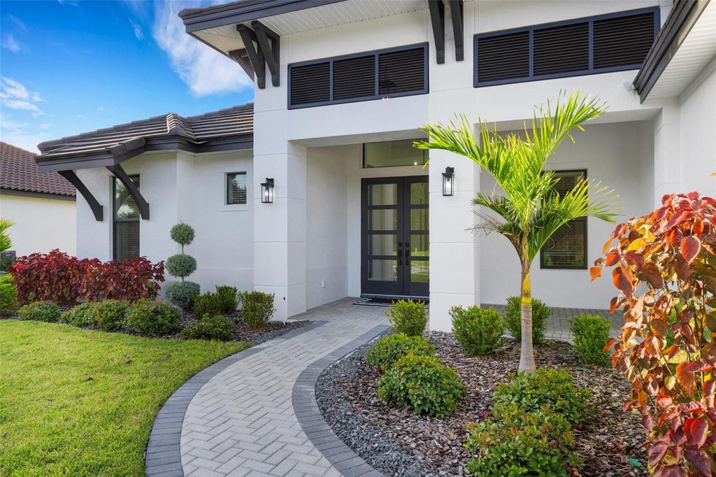 Photo of 1969 Grasslands Boulevard, Lakeland, FL 33803 (MLS # L4945736)