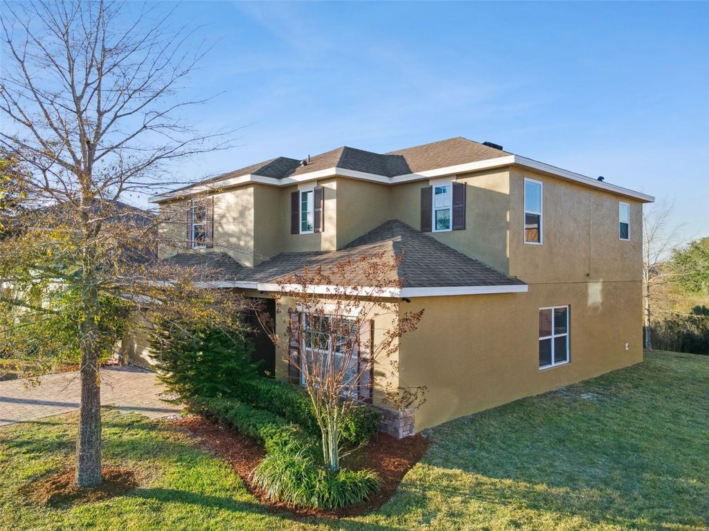 Photo of 1234 Andalusia Loop, Davenport, FL 33837 (MLS # O6363396)