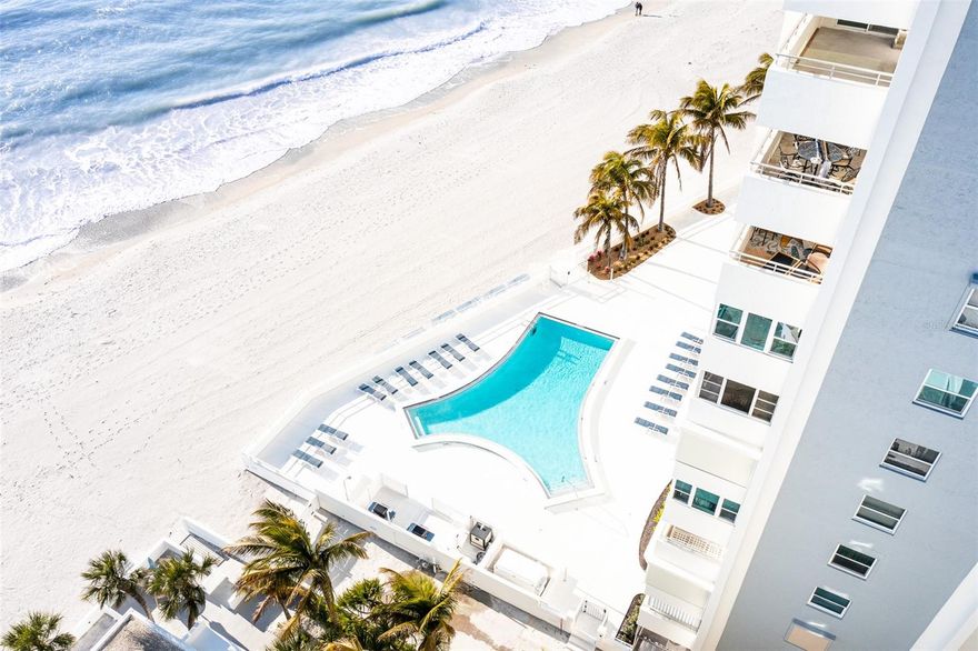 ****There is nothing left to do. Nothing to imagine. Completed in 2022, everything has been upgraded and transformed into the most modern luxury. This high-floor corner residence on Lido Beach in the Key South Tower building  has been completely transformed—from ceilings to floors—into a home where every high-end creature comfort is already in place and water views unfold from every window. 

****Panoramic vistas stretch across the Gulf of Mexico, Sarasota Bay, the Ringling Bridge, and downtown Sarasota, creating a constantly shifting backdrop of light, water, and skyline. Set within a Lido Beach building that has already been elevated to the highest modern building standards, this residence offers peace of mind. The HOA’s abundant reserves reinforce the sense of security -- owners love living here.
Inside, porcelain tile flows throughout, complemented by all-new ceilings and modern lighting that set a sophisticated, contemporary tone.

****The kitchen is both elegant and functional, featuring abundant new wood cabinetry, quartz countertops, and new appliances—designed for everything from casual mornings to elevated entertaining. The primary suite is a private sanctuary, framed by water views and finished with the finest luxury tile. It offers a walk-in closet, an ensuite bath with a walk-in shower, and thoughtful storage. The guest suite is equally impressive, with new tile, a walk-in closet, and beautiful views of the Intracoastal Waterway and downtown Sarasota. Spacious enough for a king bed, it also features its own walk-in shower, making it ideal for guests who appreciate comfort and privacy.

****Beyond the residence, Key Tower South has been fully reimagined, with the lobby and common areas completely renovated in 2025. Residents enjoy 220 feet of private Gulf frontage, a heated beachfront pool, expansive sundeck, direct beach access, saunas, a fitness room, library, bike storage, and on-site management—resort-level amenities without the crowds.

****This is not simply a condo. It is a fully realized beachfront lifestyle—elegant, effortless, and complete. Call now for a private showing. Prefer to experience it from afar?  Drone footage and immersive fly-throughs are available.