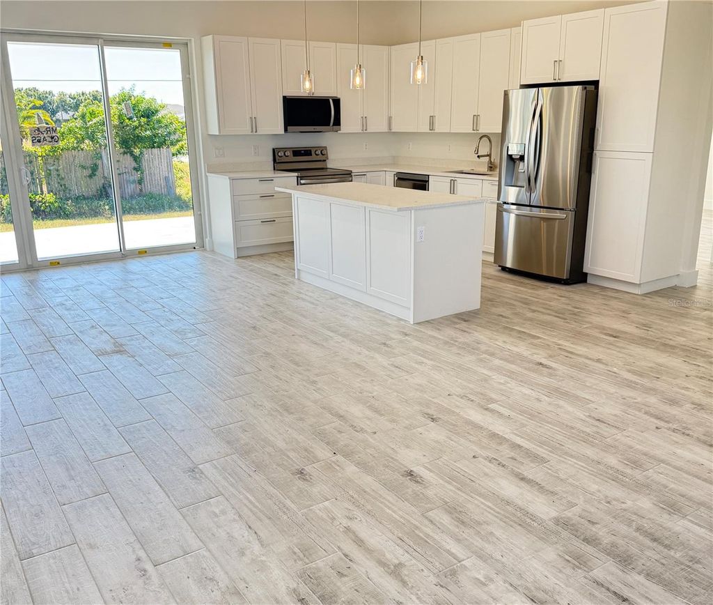 Photo of 571 Mimosa Avenue NW, Port Charlotte, FL 33952 (MLS # A4672465)