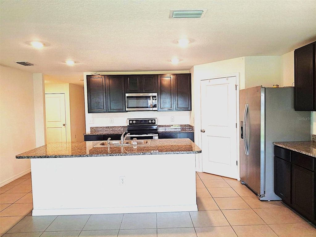 Photo of 10308 Charlotte Drive, Parrish, FL 34219 (MLS # TB8440423)