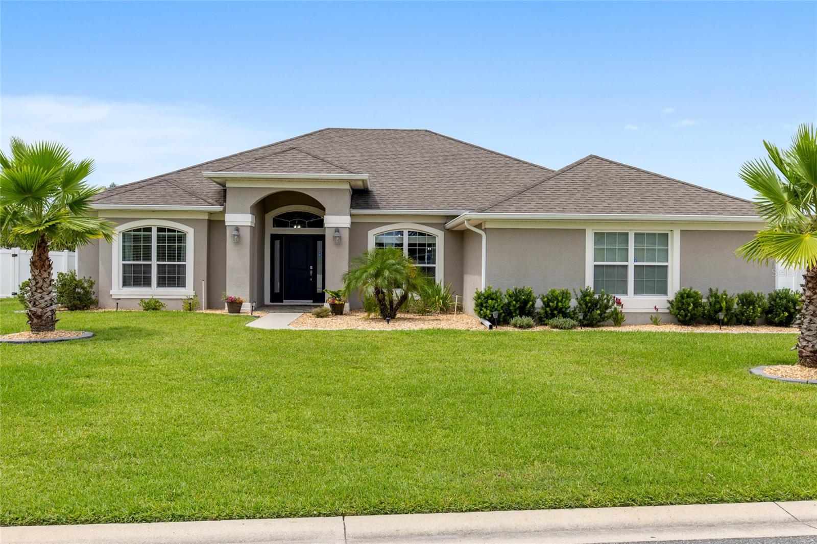 Located in desirable Preserve at Heath Brook, This beautiful 4-bedroom, 2-bathroom home with a side-entry 2-car garage and versatile flex room offers an inviting and functional layout you’ll love coming home too. The open design features a spacious living, dining, and kitchen area with vaulted ceilings, granite counters, tile backsplash, wood cabinetry with pull-out trash, and stainless-steel appliances. Enjoy meals in the breakfast nook or host in the formal dining room. Durable LVP and tile flooring flow throughout the home for both style and easy maintenance. The split-bedroom layout includes a generous main suite with a tray ceiling accented by crown molding, dual walk-in closets, and an en suite bath featuring a garden tub and separate shower. The flex room provides the ideal space for an office or playroom. Outdoors, unwind in your private oasis with a covered porch, extended patio, with a large birdcage enclosure and fenced backyard. Conveniently located near shopping, entertainment, and healthcare, this home offers comfort, style, and convenience in every detail.