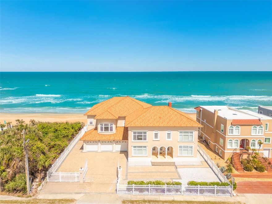 A Once-in-a-Lifetime Opportunity to Own a Piece of Ormond Beach History. Welcome to 33 Ocean Shore Boulevard, a breathtaking oceanfront estate that is as rich in history as it is in grandeur. Known as the Prettyman House, this historical landmark, built in 1918, has been lovingly restored to preserve its original charm while seamlessly incorporating modern luxuries. Once the esteemed Villa Mar Oceanfront Bed & Breakfast, this extraordinary property presents a rare opportunity to own an iconic residence in one of Florida’s most sought-after coastal communities.

Spanning an impressive 8,744 square feet, this eight-bedroom, eight-and-a-half-bathroom estate is the epitome of luxury living. The meticulous restoration highlights exquisite architectural details, from elegant crown moldings, baseboards, and shoe moldings to the stunning combination of oak hardwood, marble, and tile flooring. Each room radiates timeless elegance, enhanced by top-of-the-line fixtures and finishes that define estate-quality living.

Nestled on a 0.34-acre lot, this direct oceanfront property boasts an enviable 90 feet of pristine coastline in Ormond Beach’s exclusive “No Drive” zone. The estate offers countless opportunities to bask in coastal beauty, whether enjoying the sunrise from the private waterfront loggias, unwinding in the spa room, or gathering in the stately foyer by the fireplace.

From the moment you step through the grand entrance, you are welcomed into an elegant formal living room, where a fireplace and breathtaking ocean views create an atmosphere of timeless charm. Just beyond, two spacious first-floor bedrooms, each with their own en-suite bathroom, offer comfort and privacy—one with direct access to the pool deck, inviting you to step outside and soak in the coastal breeze.

Moving through the vestibule, you’ll find an additional living area that seamlessly transitions into the grand kitchen and dining room, where expansive windows frame the stunning ocean backdrop. Designed to accommodate both intimate gatherings and large-scale entertaining, the chef’s kitchen is a masterpiece, featuring commercial-grade stainless steel appliances, a dual gas-top convection oven, and exquisite finishes that elevate the culinary experience.

Ascending to the second floor, the primary suite is a true sanctuary, boasting panoramic ocean views, a private balcony, a spa-inspired en-suite bathroom complete with a Jacuzzi tub, his-and-her sinks, and a walk-in shower, as well as an office, work-out room, and a private spa room with a private shower for ultimate relaxation. The second floor also features four additional bedrooms, each with their own luxurious en-suite bath, adding to the home’s grandeur.

Finally, venture up to the third floor, where a private media room awaits - your personal media room to enjoy movie nights in absolute comfort, providing the perfect retreat for entertainment and relaxation.

This estate seamlessly blends historical charm with modern luxury. Equipped with system, a sprinkler system, a full-home generator, and a three-car garage with ample parking, every detail has been designed with convenience and peace of mind in mind. 
Rarely does a home of this magnitude, history, and prime location become available. This estate is truly a rare gem for those seeking the pinnacle of Ormond Beach luxury living.
Appointment Only. Proof of Funds Required.