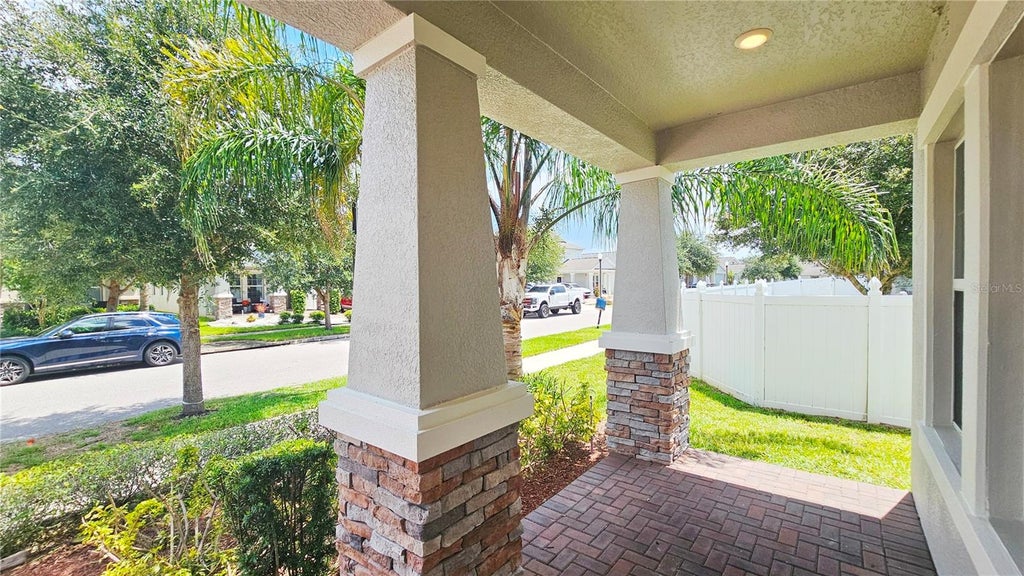 Photo of 11048 Sweetgum Woods Drive, Orlando, FL 32832 (MLS # O6426340)