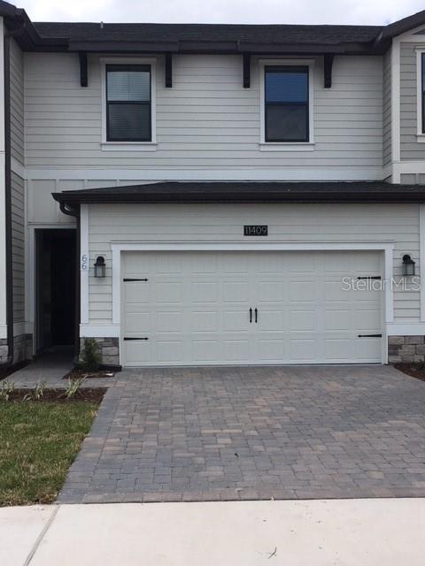This elegant & impressive two story townhome includes three bedrooms and two and a half bathrooms. The kitchen with island overlooks the spacious great room and dining area. Second floor features master suite with large closet, garden tub and separate shower, laundry room and 2 additional bedrooms. This is a high energy efficient home featuring 42” wood cabinetry, quartz countertops in both kitchen and bathrooms, slate appliances, state of the art security system. This is a smart home, connected with fiber optic and home is fitted with WiFi routers and is equipped with all new wireless technologies: RING door bell, AC thermostat, garage door opener and Front door lock. The home has a two car garage, a rear lanai and a washer and dryer that are included. The Oaks at Moss Park has a swimming pool, nature trails, numerous ponds, and a tot lot for families. *Bonus Amenity Included* -All RE/MAX 200 Realty Property Management Division residents are enrolled in the Resident Benefits Package (RBP) for $49.95/month which includes liability insurance, credit building to help boost the resident’s credit score with timely rent payments, up to $1M Identity Theft Protection, HVAC air filter delivery (for applicable properties), move-in concierge service making utility connection and home service setup a breeze during your move-in, our best-in-class resident rewards program, on-demand pest control, and much more! More details upon application. Pet friendly home (possible with approval and non refundable pet fee).