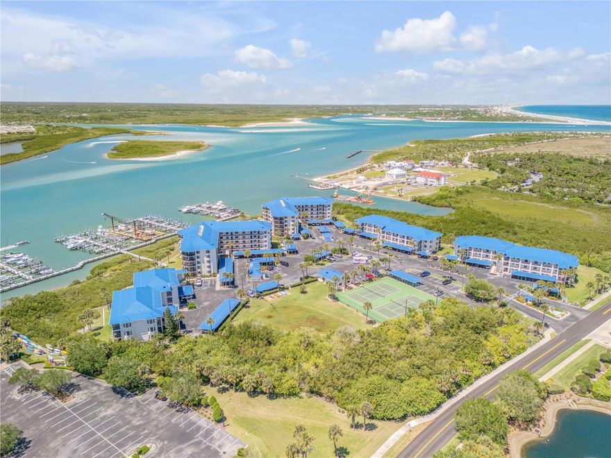 3Bd, 2Ba condo home with spectacular views of the Intracoastal waterway.  Inlet Marina Villas a 64 Slip Marina.  Unit 211 offers a light-filled, open floor plan with a large living area and views of the Intracoastal marina. The kitchen offers custom wood cabinetry, generous storage, Granite countertops, deep under mount porcelain sink, stainless GE appliances including a French door refrigerator w/ bottom drawer freezer and a glass-top electric range. Full water views from the living room, wrap-around balcony and spacious owner's suite. The owner's suite includes a bay window, walk-in closet and en-suite bathroom offering double sinks, an enormous shower and private water closet. Bedrooms 2 and 3 also offer generous spaces and bay windows. The guest bathroom offers a jetted tub/shower, solid wood vanity and under-mounted sink. The wrap- around balcony includes both open air and screened areas for watching the constant dolphin show and boat parade. Inlet Marina Villas offers resort-style living with a club house, two tennis courts, heated pool, and river-front cabana with natural gas grill kitchen and fire pit. Take a short bike or golf cart ride to all the restaurants, pubs, galleries and shops along Flagler Ave. Even Closer, just steps to the Board Walks & Dog Beach in Smyrna Dunes Park. Ready for a beach walk, surfing or a swim.....IMV owners have gated beach access through the Minorca Community. Please Note Boat Slips in the Inlet Marina Villas Marina are Separately Leased.