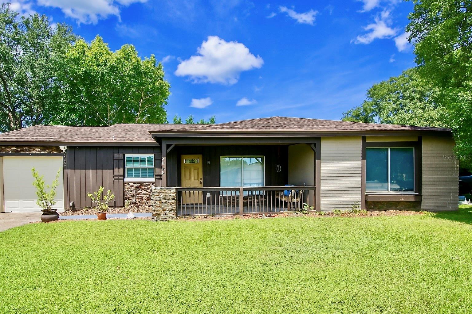 Beautifully updated 3 bedroom 2 bath house in Green Briar Village in Orlando. The home has been recently updated, with newer beautiful bathrooms and updated kitchen. Both bathrooms and kitchen have a rustic chic aesthetic, kitchen has all stainless steel appliances, rich cabinets and tile floor. Nice open floor plan! Lots of windows allow for plenty of natural light, all the floors are tile or wood/laminate. No carpet! There is an attached one car garage with washer and dryer hook up. Newer roof and hot water heater as well.  The water heater and stove/range are gas. The Green Briar community offers a pool and tennis courts as well!  Easy access to I-4, the 417 and SR 528. Application fee is $ 68.00 per adult. Applicant requirements of 3x rent as income and credit score of 650 or higher.