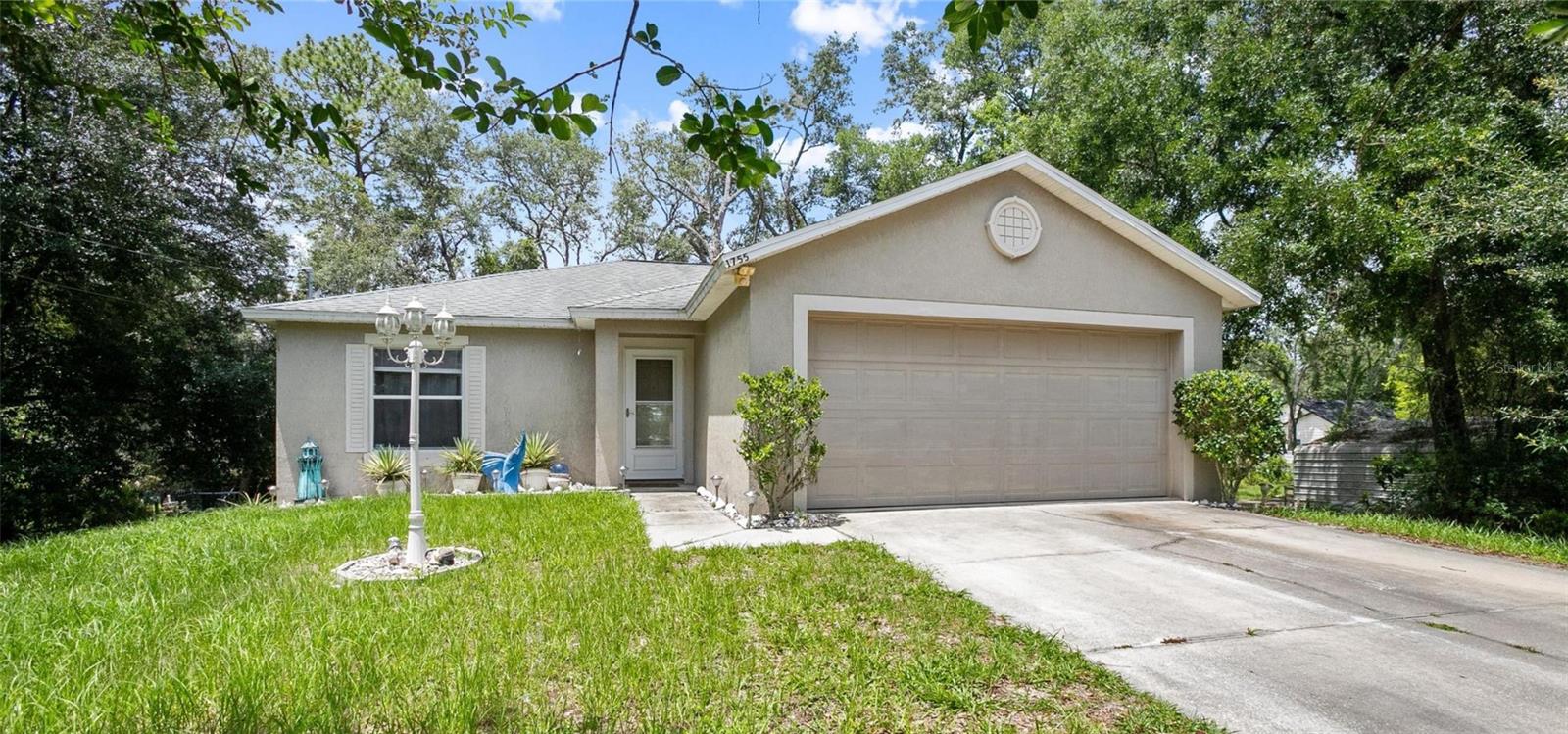 Welcome home to this inviting property nestled in a quiet, established neighborhood in Orange City. Offering incredible value, giving buyers a prime opportunity to update and personalize the space to their liking. Inside, you’ll find a spacious split-bedroom layout and an open floor plan that flows beautifully, ideal for both everyday living and entertaining. Step outside to a generous backyard featuring a cozy fire pit and a spacious deck, perfect for relaxing evenings, weekend barbecues, or gatherings with friends and family. Located just minutes from the natural beauty of Blue Springs State Park, and with convenient access to the beaches, shopping, dining, and Orlando, this property offers the perfect balance of peace, privacy, and proximity. Whether you're a first-time buyer, or looking to downsize, this home delivers comfort, value, and potential.