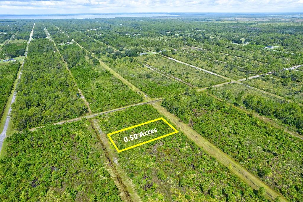 Discover the perfect opportunity to build your dream home on this spacious 0.5-acre lot in Indian Lake Estates. Nestled in a peaceful, gated community, this property offers access to a wealth of amenities, including a championship 18-hole golf course, clubhouse, fitness center, pro shop, and restaurant. Residents also enjoy exclusive access to Lake Walk-in-Water, one of Central Florida’s premier fishing and boating lakes, complete with a community marina, boat ramp, and pier. With plenty of room to design your ideal home and lifestyle, this lot combines privacy with recreational convenience. Ideally located between Tampa and Orlando, Indian Lake Estates offers the best of Florida living — a quiet, natural setting with modern comforts close at hand. Call for more details today!!