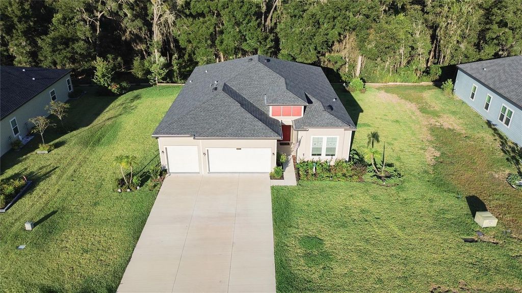 Photo of 19511 SW 77th Loop, Dunnellon, FL 34432 (MLS # TB8432011)