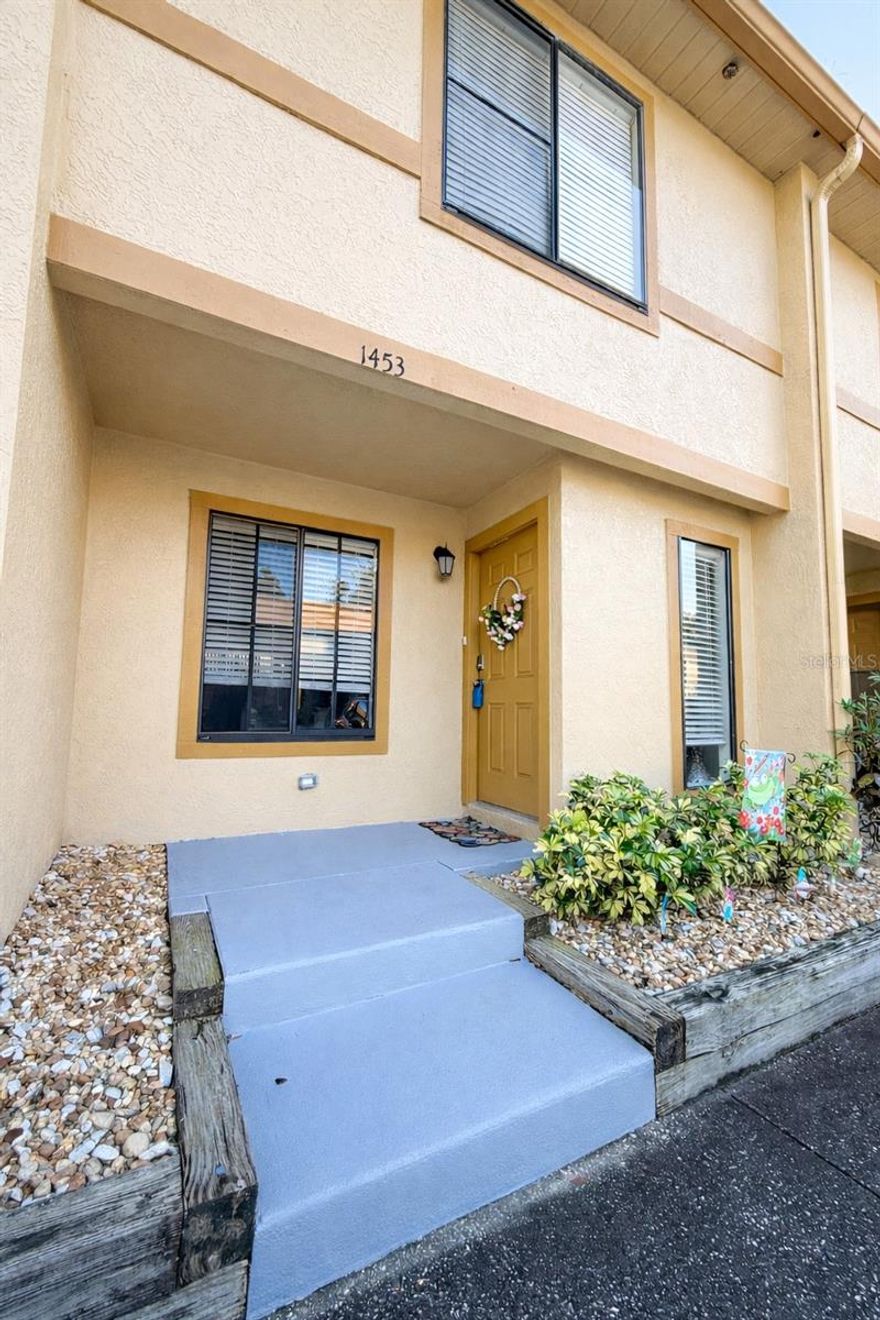 Welcome to this thoughtfully UPDATED two-story townhome in Central Brandon, where comfort, convenience, and low-maintenance living come together. The main level offers a bright, open living space with NEUTRAL FINISHES AND DURABLE FLOORING, creating a warm and inviting atmosphere. The UPDATED KITCHEN features crisp white cabinetry, stainless steel appliances, generous counter space, and a breakfast bar perfect for casual meals or morning coffee, while a DEDICATED DINING AREA provides additional space for everyday living or entertaining. The family room is filled with natural light and opens to a SCREENED-IN PORCH, leading to a PRIVATE, FULLY FENCED BACKYARD WITH TURF—a low-maintenance outdoor space ideal for pets, relaxing, or hosting friends. Upstairs, the SPACIOUS PRIMARY BEDROOM offers a peaceful retreat with soft carpeting, ample closet space, and an UPDATED EN-SUITE BATHROOM, while the SECONDARY BEDROOM is also generously sized with excellent closet space, perfect for guests or a home office. Additional highlights include UPDATED BATHROOMS, CEILING FANS THROUGHOUT, and a PRIVATE SCREENED BALCONY ideal for enjoying fresh air. The community features a RESORT-STYLE POOL AND GUEST PARKING, and the central location provides EASY ACCESS TO MAJOR HIGHWAYS, SHOPPING, AND DINING, all just minutes away and approximately 20 MINUTES TO DOWNTOWN Tampa. Home is CLEAN, UPDATED, and TURNKEY!