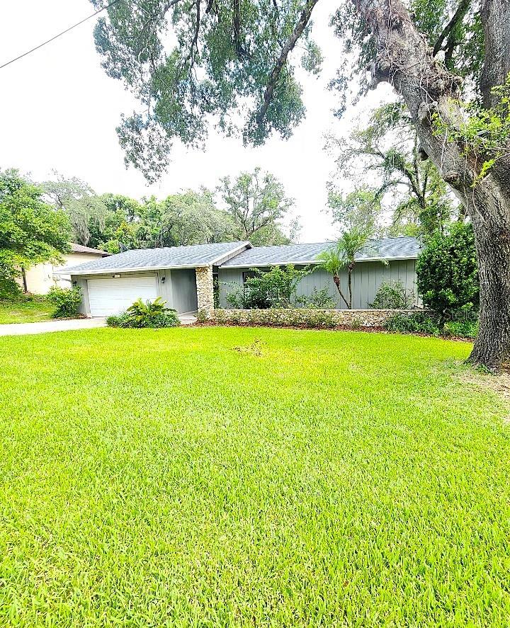 Rare opportunity to own in the wonderful area of Sanlando Springs. Beautiful 4 bedroom 2 bath split plan 1761 sq ft home located 3 blocks away from Altamonte Elementary, minutes to Altamonte Mall/Uptown Altamonte, Seminole county park (was once a golf course), Publix, Whole Foods, Bahama Breeze, Alehouse, AMC Movie theatre, Automotive stores, Home Depot, Lowes, I-4, and many more convenient locations. Upgrades include Roof 12/2021, AC 6/2025, Tankless water heater 2022, Dishwasher (Kenmore) 6/2025, Stainless Refrigerator 2022, both bathrooms completely upgraded, inside laundry room with custom cabinets and built in sink, instant shut off valves for each individual plumbing line, deck replaced, exterior painted, large trees just removed from backyard, huge screened in porch with French doors, granite kitchen countertops, pavered driveway, irrigation/sprinkler system, fireplace, and many many more. NO HOA. One original owner. Book your appointment while you can!!