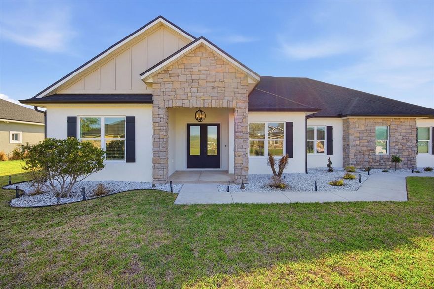 Why wait to custom build when this one already has it all? Built by the owner with exceptional attention to detail, this one-of-a-kind home on a half-acre lot in a gated community is packed with the high-end features, smart technology, and custom touches buyers dream about. Built with stainless steel beams and spray foam insulation, this home offers durability, energy efficiency, and comfort throughout, including the garage.

From the moment you walk in, you’ll notice this is not your average home. The living room is a true showstopper, featuring custom ceiling beams with a wood-wrapped finish over a steel core, creating a bold, modern look, along with surround sound and an electric fireplace. Throughout the home, you’ll find Alexa hubs in every room, app- and voice-controlled lighting, and motion-sensor lighting in the laundry room.

The primary suite feels like a retreat with cathedral ceilings and tongue-and-groove detail, a spa-inspired bath with a large walk-in shower, soaking tub, shower lighting, built-in outlets in the cabinets and drawers, and an oversized walk-in closet. Outside, the features continue with a fully fenced yard, outdoor lighting, outdoor shower already installed for a future pool, setup for an outdoor kitchen, and beautiful tongue-and-groove ceilings on both the front and back porches.

Additional highlights include a 4-zone AC system allowing customized temperature control throughout the home, gas dryer, whole-house gas generator, sliding pocket doors, washer and dryer included, underground utilities for added peace of mind during Florida storm season, neighborhood park, and well irrigation.

Why go through the hassle of custom building when this fully loaded custom home in a gated community is already waiting for you? Come see it for yourself.