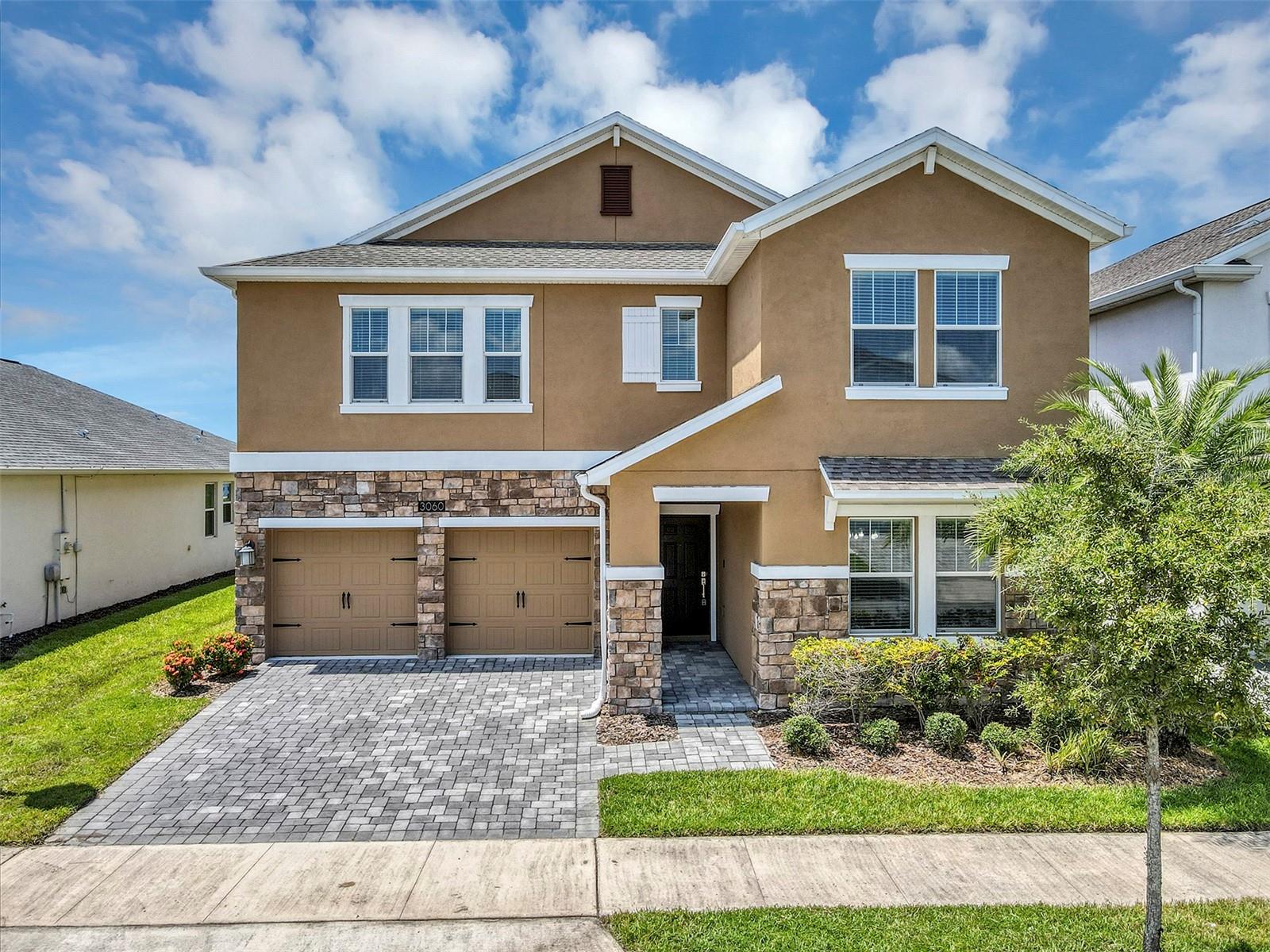 One or more photo(s) has been virtually staged. “Big, bold, and beautifully priced.” Tucked inside the gated Reflections at Storey Lake, this massive 5-bedroom, 3-bathroom retreat offers the kind of space, privacy, and potential that’s nearly impossible to find—especially at this price.
Imagine waking up to serene pond views with no rear neighbors, sipping coffee on your covered patio, and spending weekends poolside or teeing off at mini-golf—all without leaving your community. This home delivers the Florida resort lifestyle in full, with access to clubhouses, fitness centers, splash pads, Tiki bars, and waterparks, just minutes from Disney Springs and Walt Disney World.
Inside, you’ll find a blank canvas—a spacious, light-filled interior ready for your vision. Whether you're dreaming of bold design statements or subtle upgrades, this home is your playground. First-floor primary suite for easy living.Dedicated office space for remote work or creative pursuits.Two laundry rooms for ultimate convenience.Oversized great room perfect for entertaining or relaxing.3-car garage and brick-paved backyard with room to expand. Endless Possibilities: Build an outdoor kitchen. Create your own backyard oasis. With nearly 4,000 sq ft of living space and a generous lot, this home is big on lifestyle and even bigger on value. Location Perfection: Minutes from major highways, shopping, dining, and entertainment. Whether you're a full-time resident, snowbird, or investor, this is your chance to own a slice of paradise—without the premium price tag.