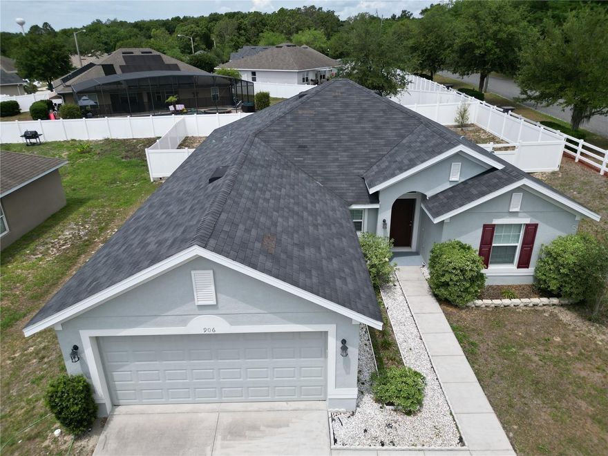 Welcome to this beautifully maintained 4-bedroom, 2-bath home located on a desirable corner lot in the peaceful yet convenient community of Chelsea's Run. Built in 2018, this spacious block home offers modern comfort, thoughtful design, and the perfect setting to create lasting memories.
Ideally situated just minutes from US Hwy 27/441, you’ll enjoy easy access to shopping, dining, entertainment, and everyday conveniences while still coming home to a quiet neighborhood atmosphere.

Step inside to an inviting entryway featuring vaulted ceilings and an open-concept floor plan designed for both comfortable family living and effortless entertaining. The kitchen is the heart of the home, complete with a center island perfect for meal prep, casual dining, or serving guests.

The split-bedroom layout provides added privacy, with a spacious primary suite featuring a large walk-in closet and an ensuite bath with dual vanities, a relaxing garden tub, separate shower, and private water closet. A versatile front bedroom with a generous closet offers endless possibilities as a home office, den, or guest space. Two additional bedrooms and a full guest bath are located on the opposite side of the home, along with a conveniently sized laundry room.

Enjoy Florida living year-round from the covered back patio — the perfect spot for morning coffee or unwinding in the evening. With a 2018 roof, HVAC, and water heater, this home offers peace of mind along with style and functionality.

Don’t miss your opportunity to make this exceptional home your own and start enjoying the Florida lifestyle today!