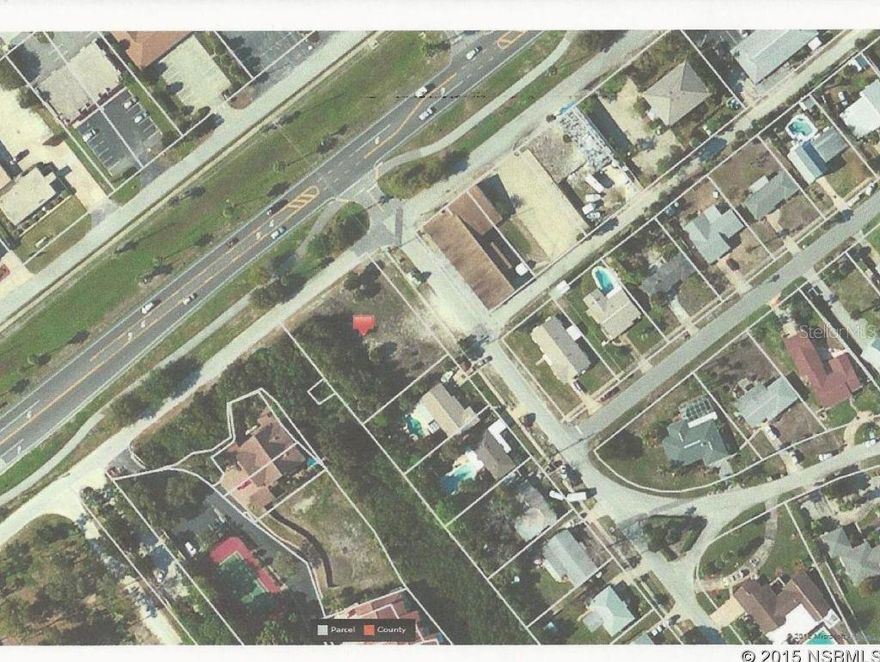 Vacant lot on the North Causeway. Zoning allows business/commercial.; Cleared: Partial ;Water: Available at Site