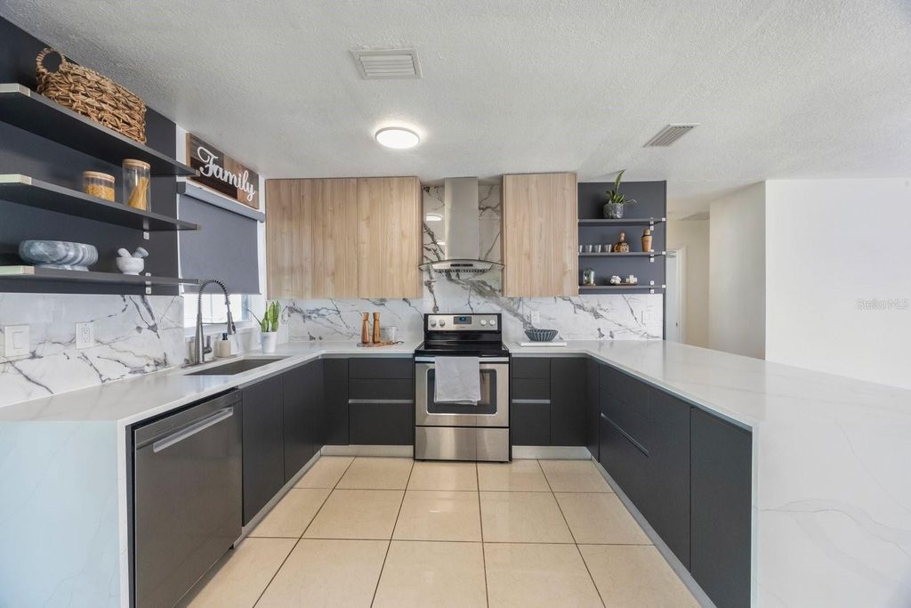 Photo of 2074 Powderhorn Drive, Clearwater, FL 33755 (MLS # TB8440597)