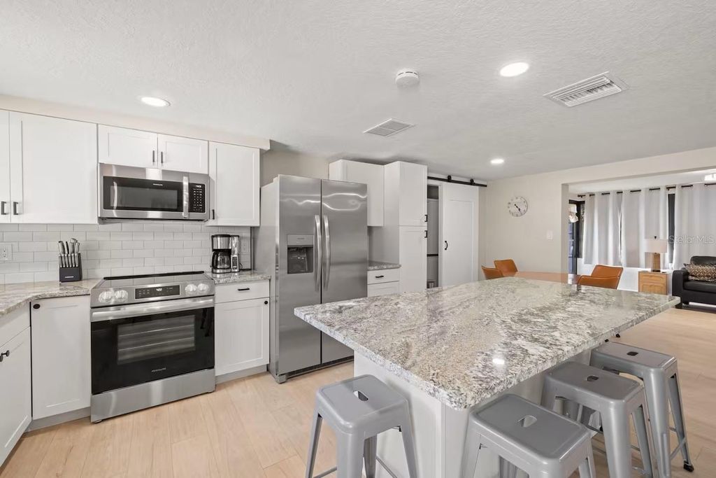 Photo of 201 South Street, Palm Harbor, FL 34683 (MLS # TB8399886)