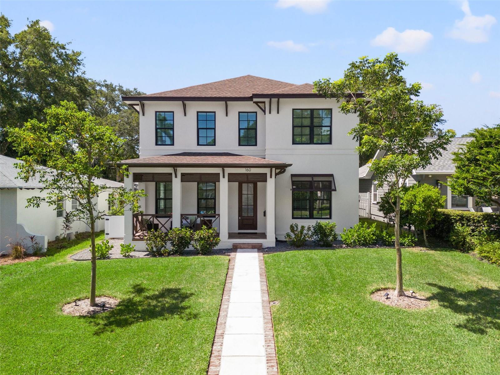 Welcome to this 2023 ALL-BLOCK, one-of-a-kind home that offers the perfect blend of luxury and comfort. Nestled in the charming Old Northeast neighborhood, just one block from Coffee Pot Bayou, it provides easy access to scenic waterfront parks and is only a short bike ride from the vibrant downtown area.
Located in a NON-FLOOD zone, this home ensures worry-free living and peace of mind. This exquisite residence includes 5 Bedrooms + 3 Baths + Loft + Studio Style Accessory Dwelling Unit (ADU), and spans a total of 3,786 sq ft, with 3,229 sqft in the main home, and the additional 557 sqft in the ADU above the two-car garage. The ADU includes a kitchen, walk-in storage closet, a full bathroom, and a balcony.
Situated on a tree-lined street, this home welcomes you with a brick-lined walkway leading to a warm and welcoming front porch, offering plenty of space to enjoy the peaceful neighborhood surroundings. Walking through the front door, you'll discover a convenient study and a versatile guest bedroom with an ensuite bathroom. Continuing on, you'll find the spacious family room, complete with an electric fireplace that enhances the comfort of the space.
The main home features soaring 10-foot ceilings on the first floor and 9-foot ceilings on the second floor, creating a pleasant atmosphere filled with natural light. The open-concept kitchen boasts stylish Maple Shaker 42” upper cabinets and 36” lower cabinets, quartz countertops, and an expansive island, all complemented by top-of-the-line stainless steel GE appliances. The kitchen flows seamlessly into the living area, making it perfect for entertaining friends and family. Additionally, there is a designated dining area complete with large windows to enjoy the view while you dine.
You will also notice plenty of storage space throughout this thoughtfully crafted floor plan. Upstairs, you’ll find a multipurpose loft area featuring a dry bar and beverage fridge. Additionally, appreciate the convenience of a dedicated laundry room with a sink and plenty of storage space with cabinetry and closet space. To the right of the loft, you’ll discover two guest bedrooms filled with natural light, offering spacious walk-in closets, and a shared full bathroom.
To the left of the loft is the inviting primary bedroom, featuring double closets and a stunning bathroom complete with his-and-hers vanities, a large walk-in shower, a water closet, and a soaking tub; truly a serene oasis where you can unwind after a long day. This home is equipped with features including dual thermostats, a tankless gas water heater, a whole-house water softener, and impact-resistant windows and doors, enhancing convenience and energy efficiency. Enjoy your morning coffee on the screened-in lanai overlooking the peaceful backyard, which offers ample space for a future pool. Indulge in scenic walks along Coffee Pot Bayou to Northshore, Vinoy Park, and the pier. Additionally, you're only a 15-minute drive from breathtaking beaches and a quick 20-minute commute to Tampa. Contact us now to schedule a tour and make this dream home yours!