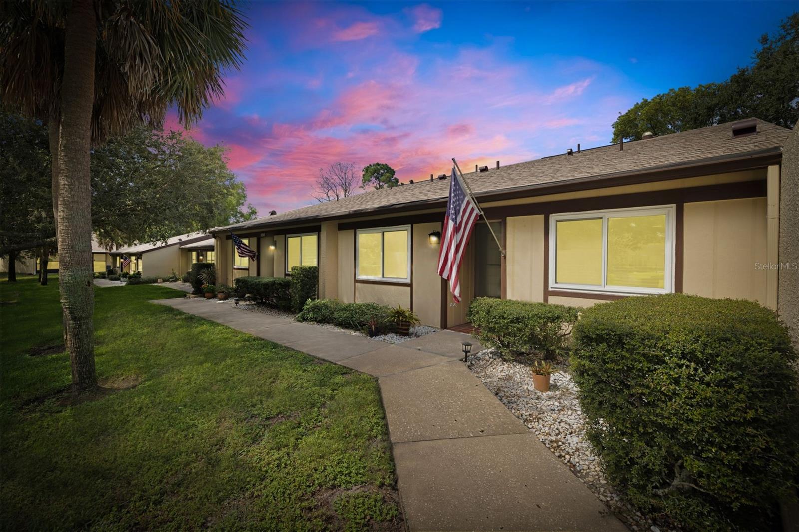 Welcome Home to this elegantly updated two-bedroom, two-bathroom villa in Dollar Lake Village, located in the highly sought-after community of Timber Oaks, a 55+ Community. This beautiful home offers 1,210 square feet of thoughtfully designed living space, combining modern upgrades with timeless comfort.
Step inside to discover a bright and inviting kitchen featuring granite countertops, shaker style cabinetry, tile backsplash, and all new appliances with plenty of storage and counter space! The main living area has new waterproof vinyl flooring and flows seamlessly into a spacious screened-in porch perfect for enjoying peaceful garden views year-round. The split floor plan provides privacy, with the primary suite offering a tranquil retreat that is spacious enough for a king-size bed, all your furniture. Complete with a walk-in closet, spacious vanity, lighting, and a beautifully updated en-suite bathroom that features a new vanity, new toilet and a gorgeous custom tile, walk-in shower. The guest bedroom and secondary bathroom have also been tastefully updated with new fixtures, custom closet shelving, a new vanity, new toilet and modern touches.
Additional highlights include an indoor laundry room, ample storage, new ceiling fans throughout, updated outlets and switches, fresh interior paint, a NEW ROOF (2025), NEW HURRICANE RATED WINDOWS AND SLIDING GLASS DOORS (2023), a NEW ELECTRIC PANEL (2024), a NEW WATER SOFTENER (2024), a tankless water heater and the A/C is (2016). Enjoy outdoor living on the upgraded patio with new tile flooring, blinds, screens, window tint, and a ceiling fan with a view of the beautifully maintained garden area. Convenience abounds with a covered parking spot, outdoor storage closet, and direct back entry for easy access during rainy days or for those with limited mobility.
Timber Oaks offers an array of resort-style amenities, including two community pools, a beautiful clubhouse with countless activities, and a heated pool and hot tub overlooking the lake. Outdoor enthusiasts will love the tennis courts, pickleball, bocce ball, and shuffleboard. Association fees include water, sewer, trash removal, cable services, roof maintenance, grounds upkeep, pest control, and other amenities, ensuring residents benefit from a maintenance-free lifestyle. Come experience all that this stunning villa has to offer!