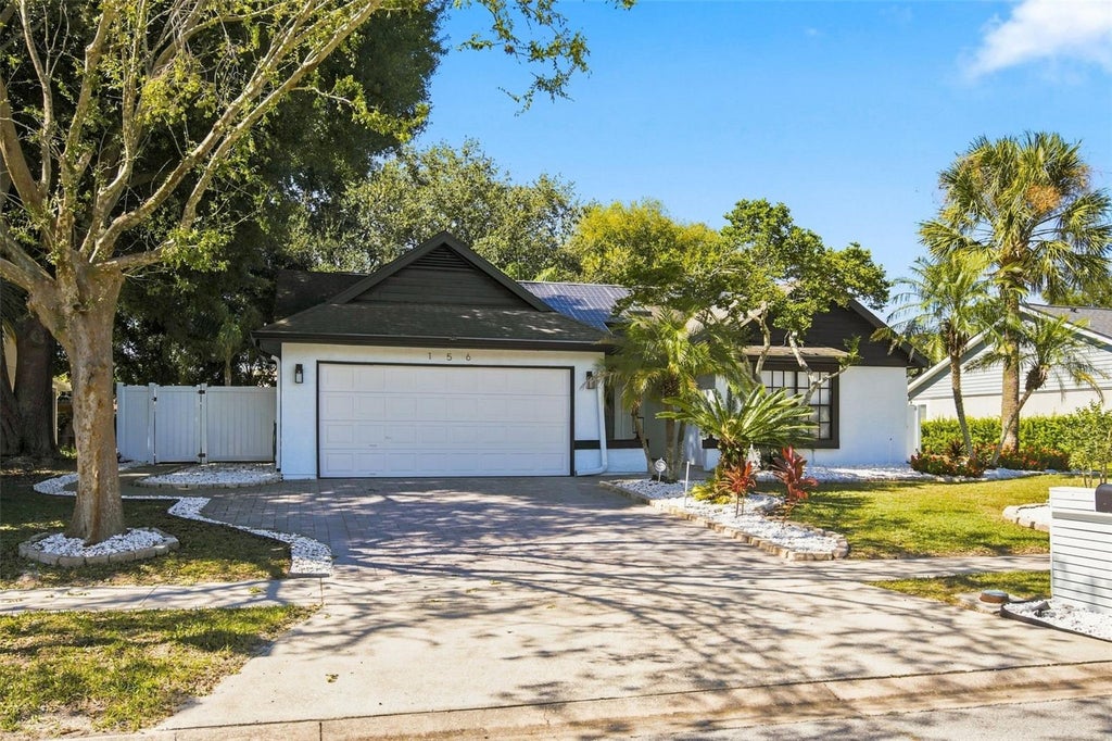 Photo of 156 Dempsey Way, Orlando, FL 32835 (MLS # O6452673)