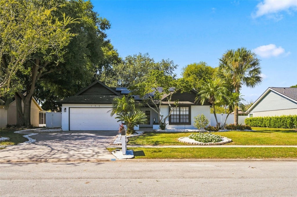 Photo of 156 Dempsey Way, Orlando, FL 32835 (MLS # O6452673)