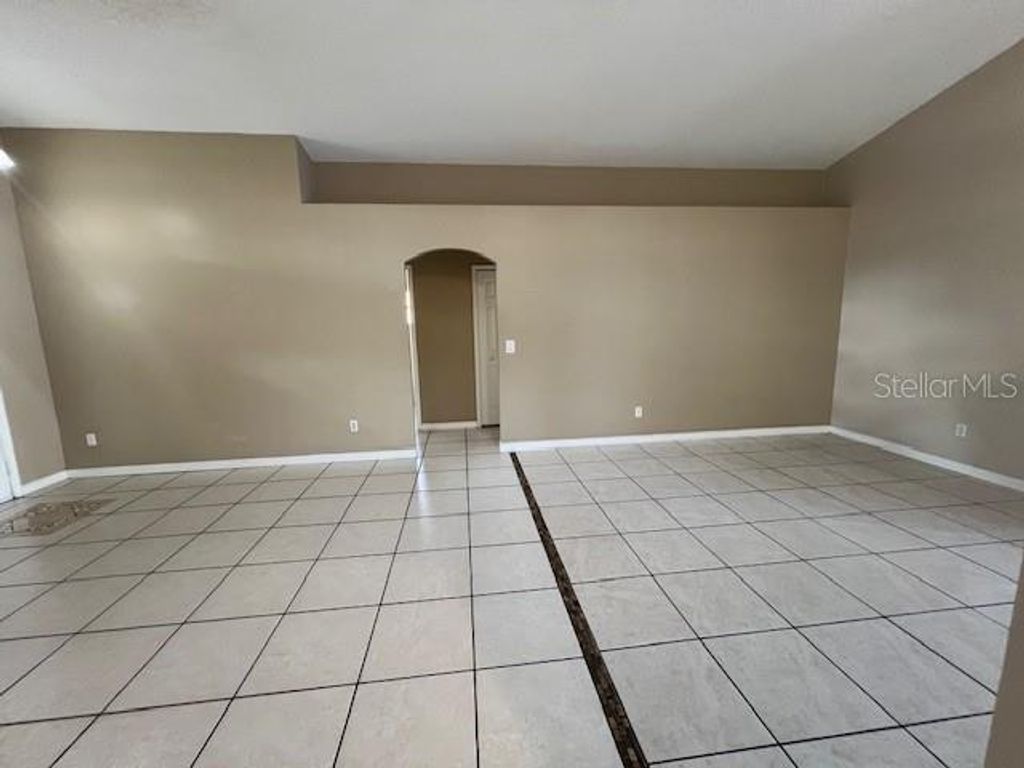 Photo of 202 Woodbury Pines Circle, Orlando, FL 32828 (MLS # O6382734)