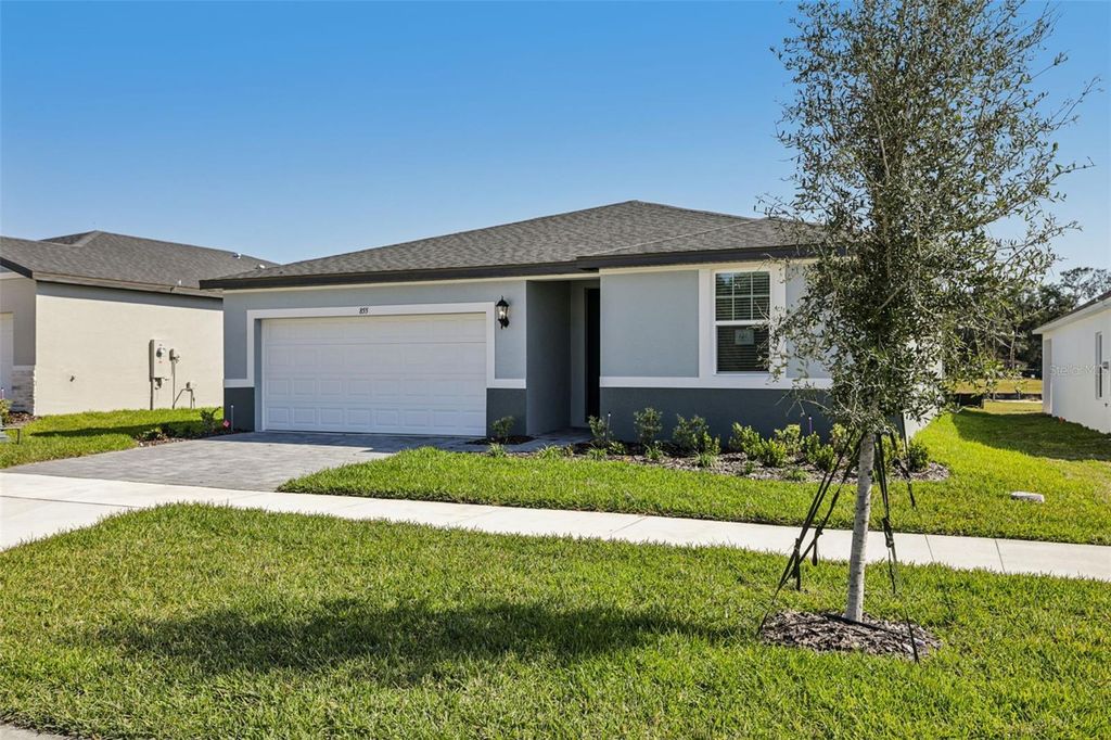 Photo of 855 Sunshower Drive, Haines City, FL 33844 (MLS # O6348081)