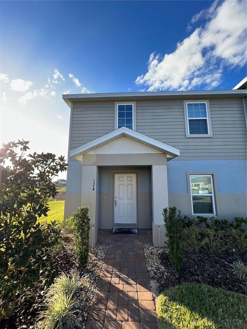 Photo of 124 Primrose Drive, Davenport, FL 33837 (MLS # O6423992)