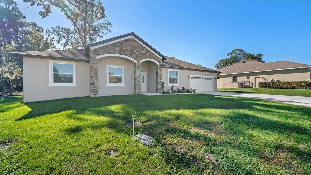 Photo of 703 Fox Gate Court, Plant City, FL 33563 (MLS # O6394471)