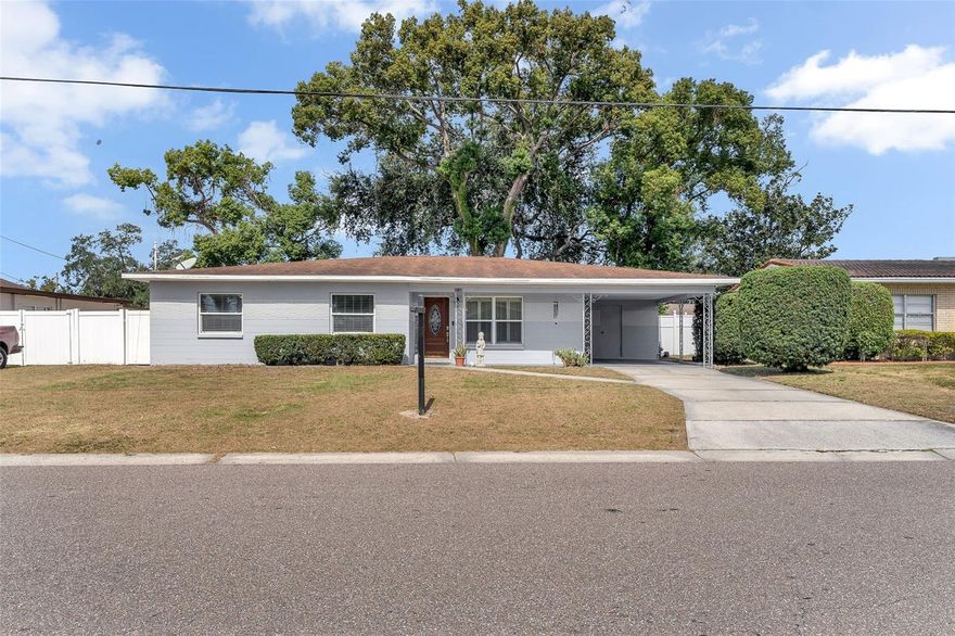Welcome to this beautifully renovated West Tampa home, offering versatility and plenty of space for living and entertaining. This residence features tile flooring throughout, a stunning kitchen with wooden cabinets, granite countertops, and stainless steel appliances, perfectly blending charm and functionality.  The main house features three spacious bedrooms, a den, and two updated bathrooms, offering comfort and flexibility. Additionally, the property features two separate mother-in-law units, making it ideal for multi-generational living, guests, or generating potential rental income.  Step outside to a large covered patio, perfect for gatherings and outdoor entertaining. Additional highlights include a 1-car carport and ample parking.  Enjoy no HOA, no CDD, and no flood insurance required—giving you more freedom and flexibility. Conveniently located near shopping, dining, major highways, and just minutes from the heart of Tampa. The property underwent professional sinkhole repair and foundation stabilization in 2013, providing peace of mind and long-term structural stability. Call now to schedule a private showing and make this stunning home yours today!