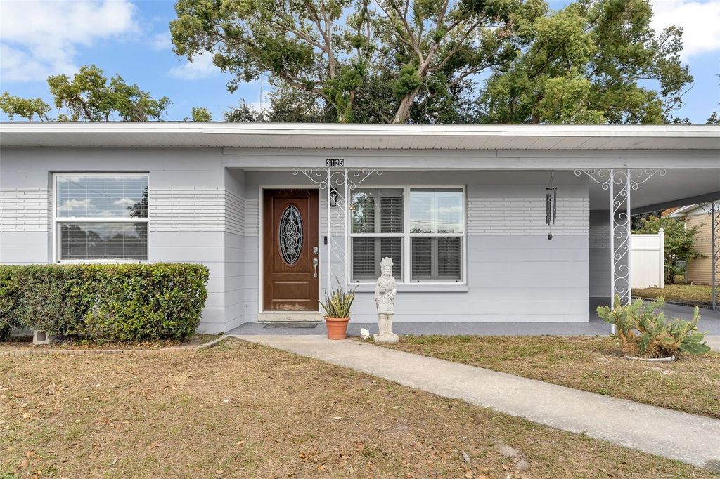 Photo of 3125 W Henry Avenue, Tampa, FL 33614 (MLS # TB8438592)