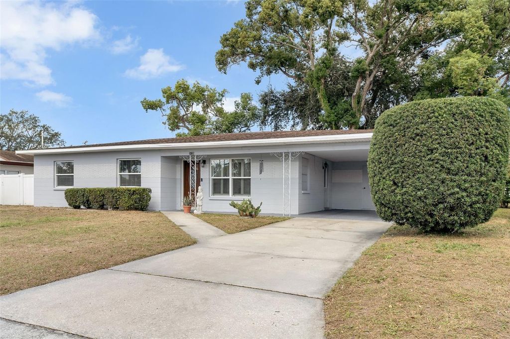Photo of 3125 W Henry Avenue, Tampa, FL 33614 (MLS # TB8438592)