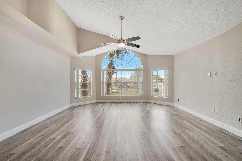 Photo of 2452 Sweetwater Club Circle #28, Kissimmee, FL 34746 (MLS # O6451091)