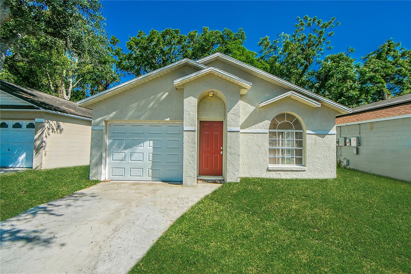 Welcome to 1073 Hamlet Drive—an updated 3-bedroom, 2-bathroom block home with over 1,000 square feet of comfortable living space, a 1-car
garage, and a prime location in the highly sought-after community of Hamlet at Maitland. From the moment you step inside, you'll be greeted by
vaulted ceilings, an abundance of natural light, and an open floor plan that’s ideal for entertaining. The spacious living room flows effortlessly to a
sliding glass door that leads out to a cozy patio—perfect for summer BBQs and enjoying the Florida sunshine. The kitchen is well-appointed with
stainless steel appliances, granite countertops, shaker-style cabinetry, and a dedicated food pantry for extra storage. The large owner’s suite
offers a true retreat with its walk-in closet and en-suite bathroom featuring a dual-sink vanity with granite countertops, an oversized, well-lit
mirror, and a garden tub with shower—perfect for soaking the day away. The home also includes a full guest bathroom and two additional guest
bedrooms, one of which includes a walk-in closet. Situated in a friendly, owner-occupied community with a low HOA fee, Hamlet at Maitland
places you near top-rated schools like Dommerich Elementary and Maitland Middle and just minutes from the best dining, shopping, and
amenities of both Maitland and Winter Park. Schedule your private showing today—this one won't last!