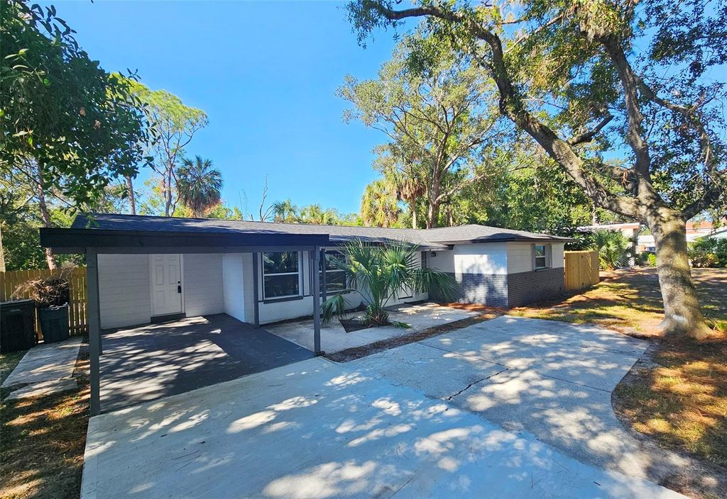 Photo of 9218 Memorial Highway, Tampa, FL 33615 (MLS # TB8440782)