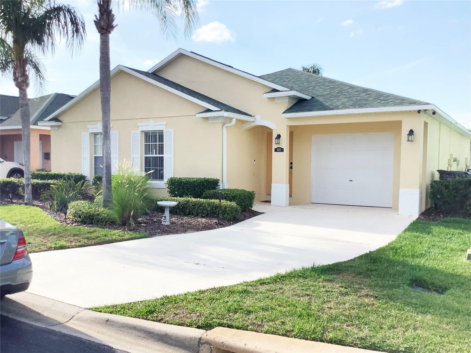 This 3-bedroom, 3-bathroom home is located in the Davenport area and is suitable for both short-term rental and primary residence. The property has an open floor plan that connects the living, dining, and kitchen areas. The living room has sliding doors leading to the pool area, allowing in natural light and air flow. The kitchen contains modern appliances, upgraded light fixtures, and a breakfast bar. The home includes master bedrooms, each with walk-in closets and ensuite bathrooms equipped with walk-in showers. One primary bedroom has direct access to the swimming pool.