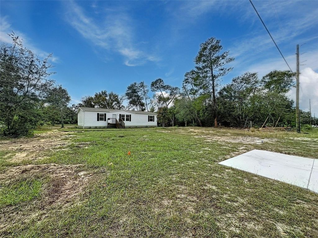 Photo of 12118 Pitcairn Street, Brooksville, FL 34613 (MLS # W7880360)