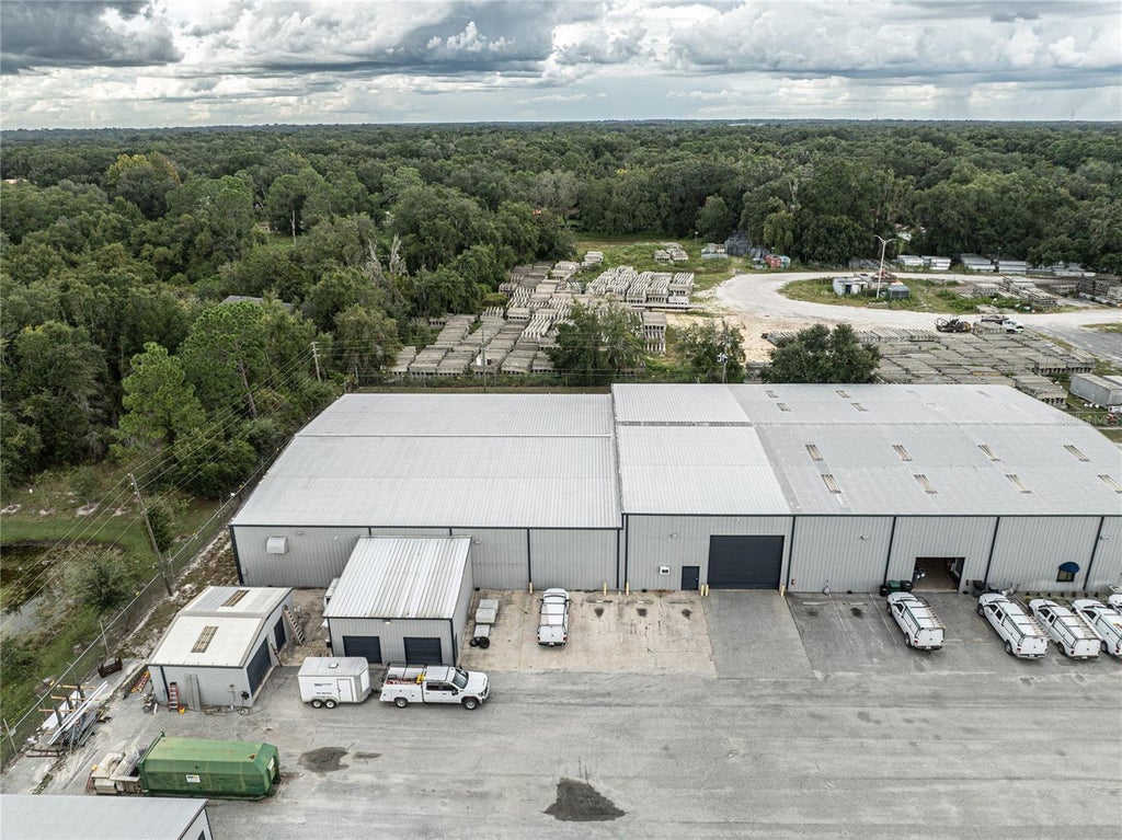 Photo of 719 Industrial Drive, Wildwood, FL 34785 (MLS # G5118977)