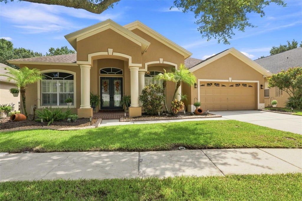 Photo of 19803 Glazing Globe Lane, Lutz, FL 33558 (MLS # TB8538441)