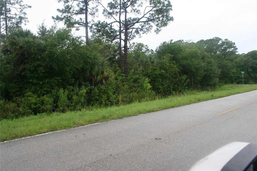 Photo of 12295 Chancellor Boulevard, Port Charlotte, FL 33953 (MLS # O6291571)