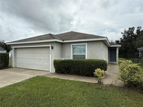 Photo of 1967 Bretton Ridge Way, Winter Haven, FL 33884 (MLS # O6444188)
