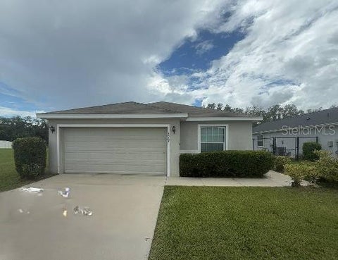 Photo of 1967 Bretton Ridge Way, Winter Haven, FL 33884 (MLS # O6444188)