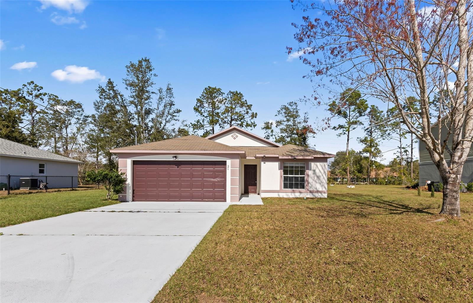 This beautifully remodeled 4-bedroom, 2-bath, 2-car garage home perfectly blends modern upgrades with everyday comfort. Step into a bright and airy open-concept layout featuring fresh interior paint and sleek tile flooring throughout. The upgraded kitchen shines with granite countertops, a spacious island, and new stainless steel appliances—including a glass-top stove and dishwasher—making it ideal for both cooking and entertaining. Conveniently located near U.S. 1 and I-95, you'll be just minutes from shopping, dining, top-rated schools, and the beach. Move-in ready and full of charm, this home is a must-see! All information taken from the tax record, and while deemed reliable, cannot be guaranteed.