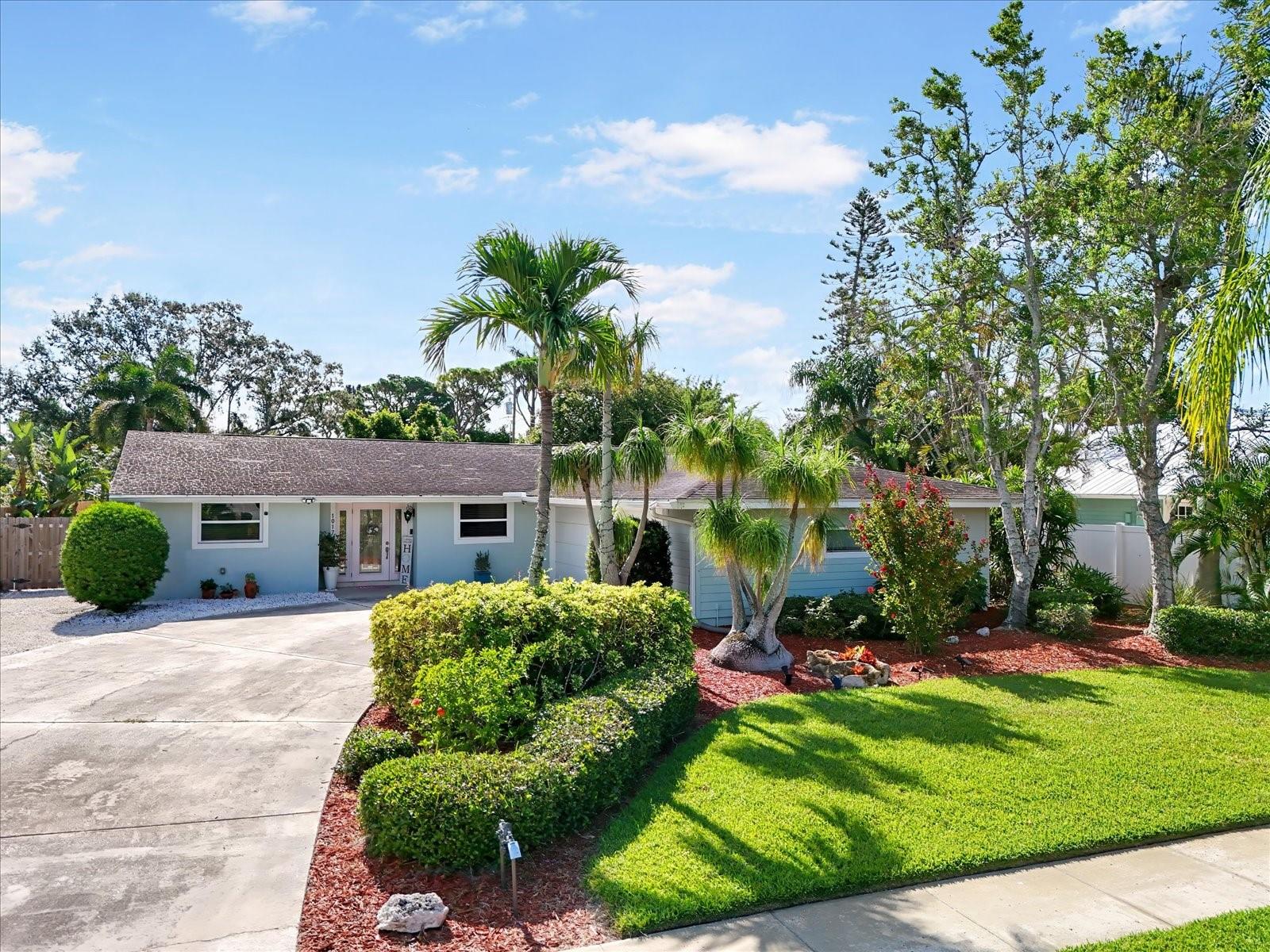 Just minutes from the world-renowned beaches of Anna Maria Island, this beautifully maintained 3BR/2BA home with a detached 1BR/1BA guest house offers the perfect blend of indoor comfort and outdoor living. Set on an oversized 0.34-acre lot, the main home features an open layout with a dedicated office/flex space, large enough to accommodate a daybed for guests or work-from-home needs. The kitchen is a chef’s delight with solid wood cabinetry, quality appliances, and ample storage. Step outside to your private backyard oasis, complete with a spacious screened lanai, resort-style pool, hot tub, and an outdoor kitchen—perfect for entertaining. The side yard features a cozy fire pit area, ideal for relaxing evenings under the stars. The detached guest house offers a full kitchen, living room, bedroom, and full bath with a private entrance—ideal for guests, in-laws, or rental income. Located just steps from the pool area, it’s the perfect retreat. Some additional highlights include a new roof to be installed by sellers prior to closing, Access to a community marina with a waitlist for boat slips where manatees frequent the area year-round. The best part about this location is that it is a prime location near beaches, dining, shopping, and boating. This is your chance to own a piece of Florida paradise with space, versatility, and coastal charm!