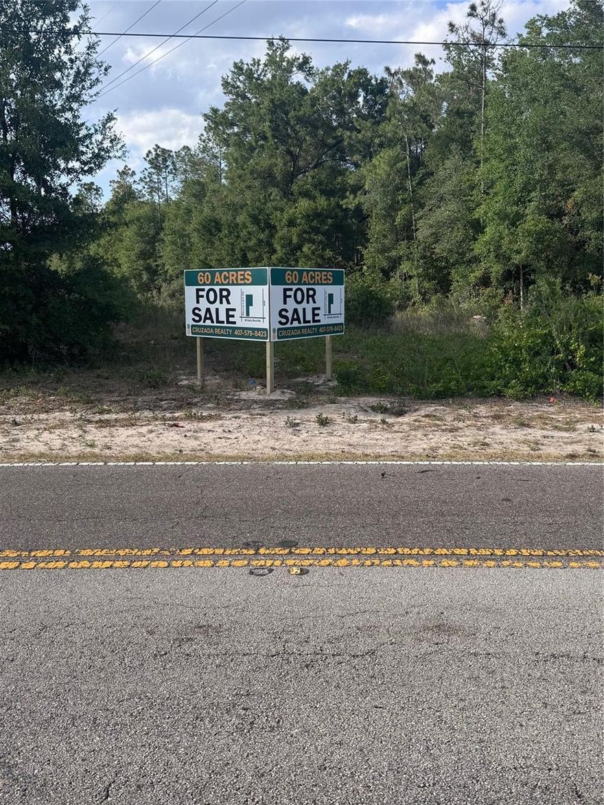 Growing  area opportunity abounds. sixty acres contiguous.. Road Frontage in developing area!Buyer to verify all dimensions