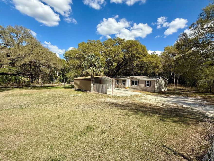 Bring the animals or plant a beautiful garden because there is ample space for it all! This updated 3 bed/2 bath home sits on a gorgeous 1 acre mol and it's completely fenced in with no direct neighbors on any side!  The 30x24 outbuilding gives you the opportunity for your own workshop or storage for all the toys! The new roof, new water heater, and updated electrical/plumbing, will keep your worries away! And the new flooring, paint, counters, vanities, lighting, etc, will bring joy every time you walk in! Wait until you retire from the day and you get to take advantage of the paradise of your own bedroom suite! Walk-in closet, 2 sinks, tons of storage, HUGE shower, and just what you need after a long day! As soon as you arrive, the energy this home provides will put your mind and body at peace! Wake up and start your morning by listening to the birds chirp on the back deck! All of this comes within just a convenient drive to all the shops, entertainment, and necessities that you'll need! Come make this home yours today!